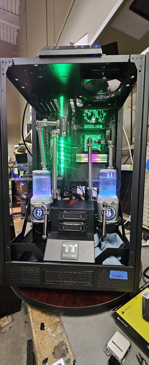 EVGA GODLIKE build with green RGB and dual reservoirs
